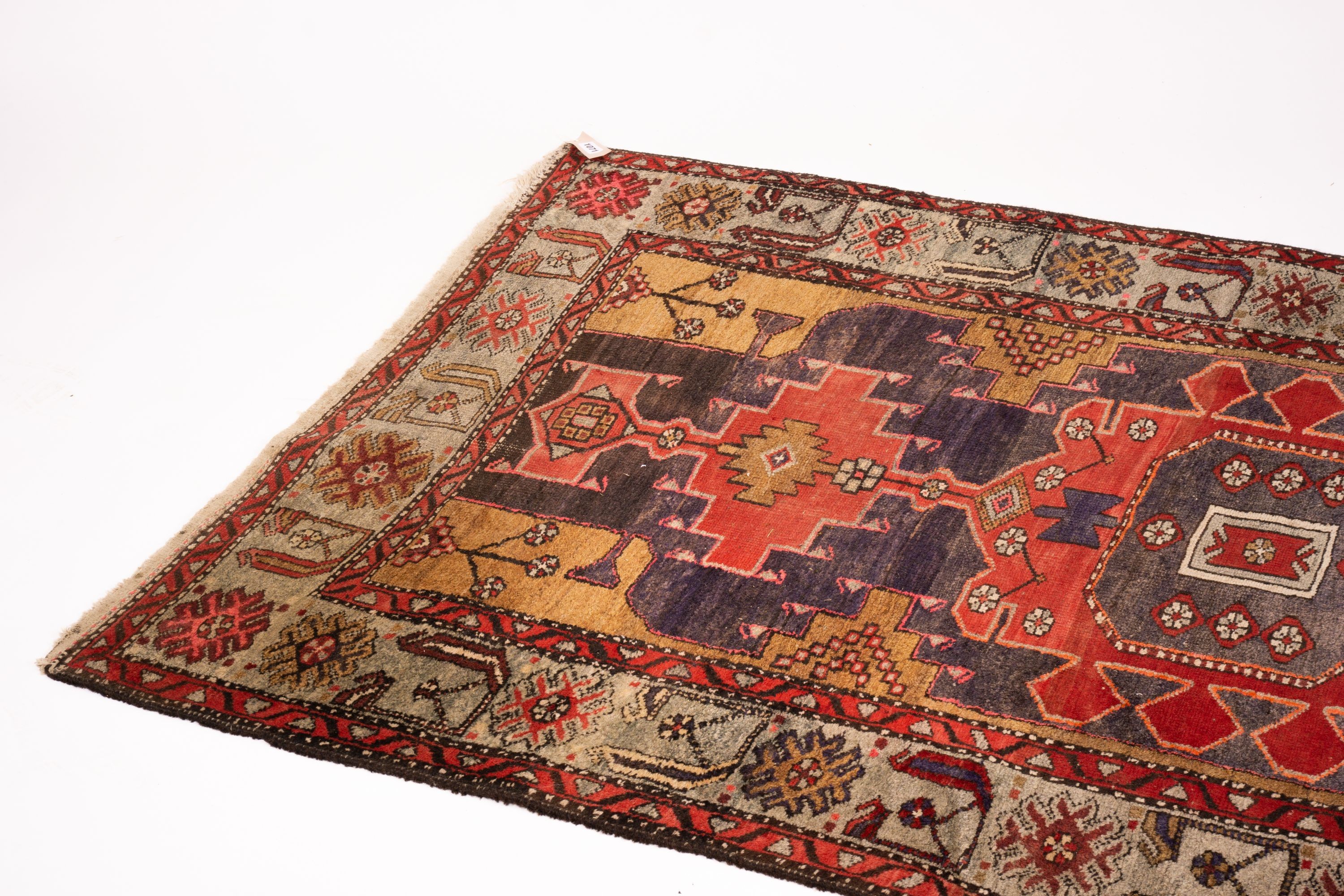 A Caucasian Kazak blue ground rug, 206 x 128cm